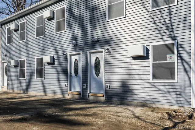 a view of a house with a garage