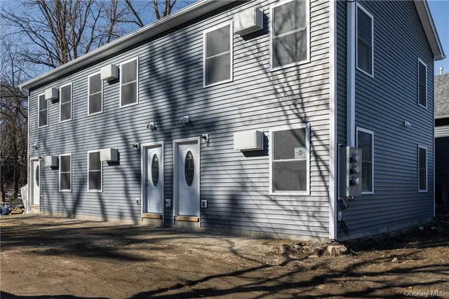 a view of a house with street