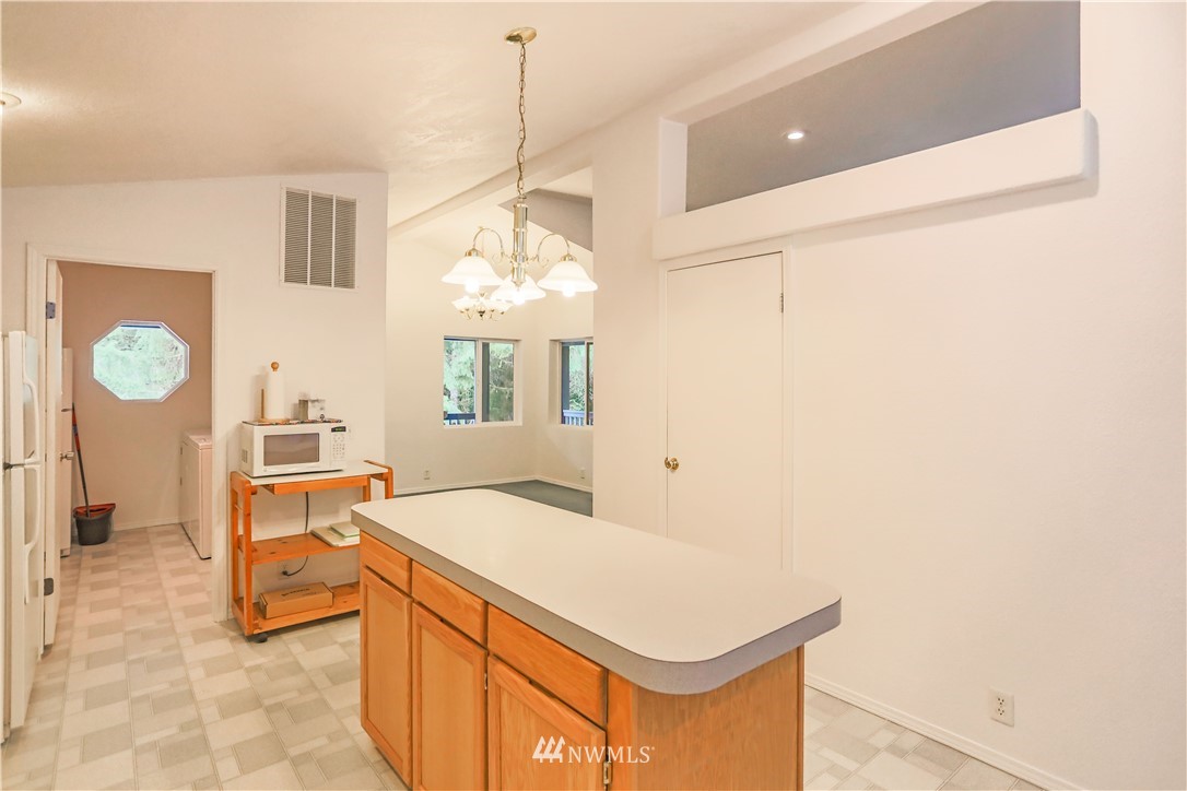 1763 Bunker Creek Road Chehalis, WA 98532 - Photo 11 of 40 a room with pool table and a chandelier