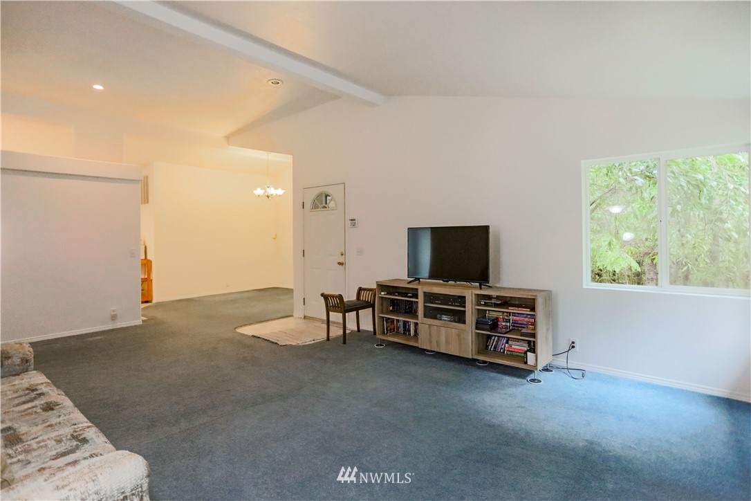 1763 Bunker Creek Road Chehalis, WA 98532 - Photo 18 of 40 a living room with furniture and a flat screen tv