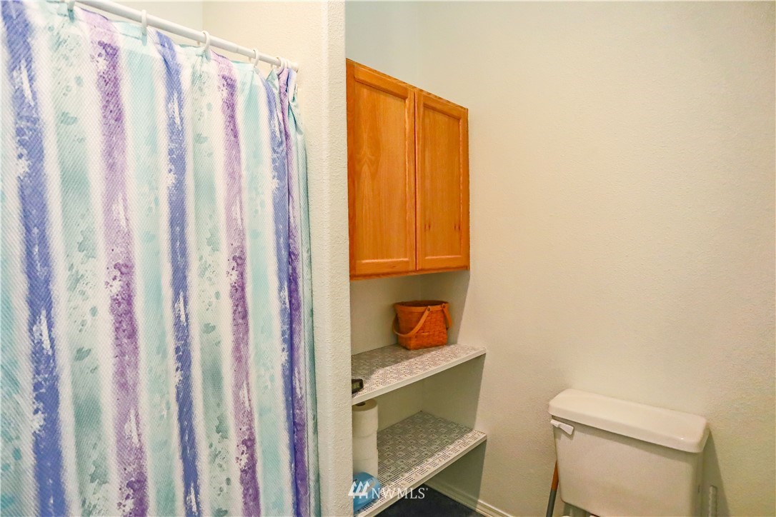 1763 Bunker Creek Road Chehalis, WA 98532 - Photo 29 of 40 a bathroom with a sink and a toilet