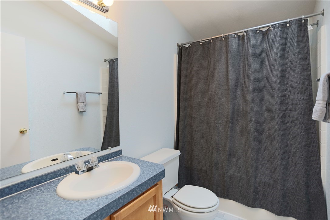 1763 Bunker Creek Road Chehalis, WA 98532 - Photo 35 of 40 a bathroom with a sink and a mirror