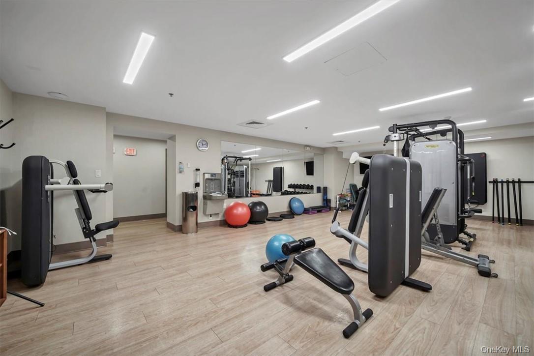 1 Renaissance Square, Unit 9D White Plains, NY 10601 - Photo 12 of 17 a view of a room with gym equipment