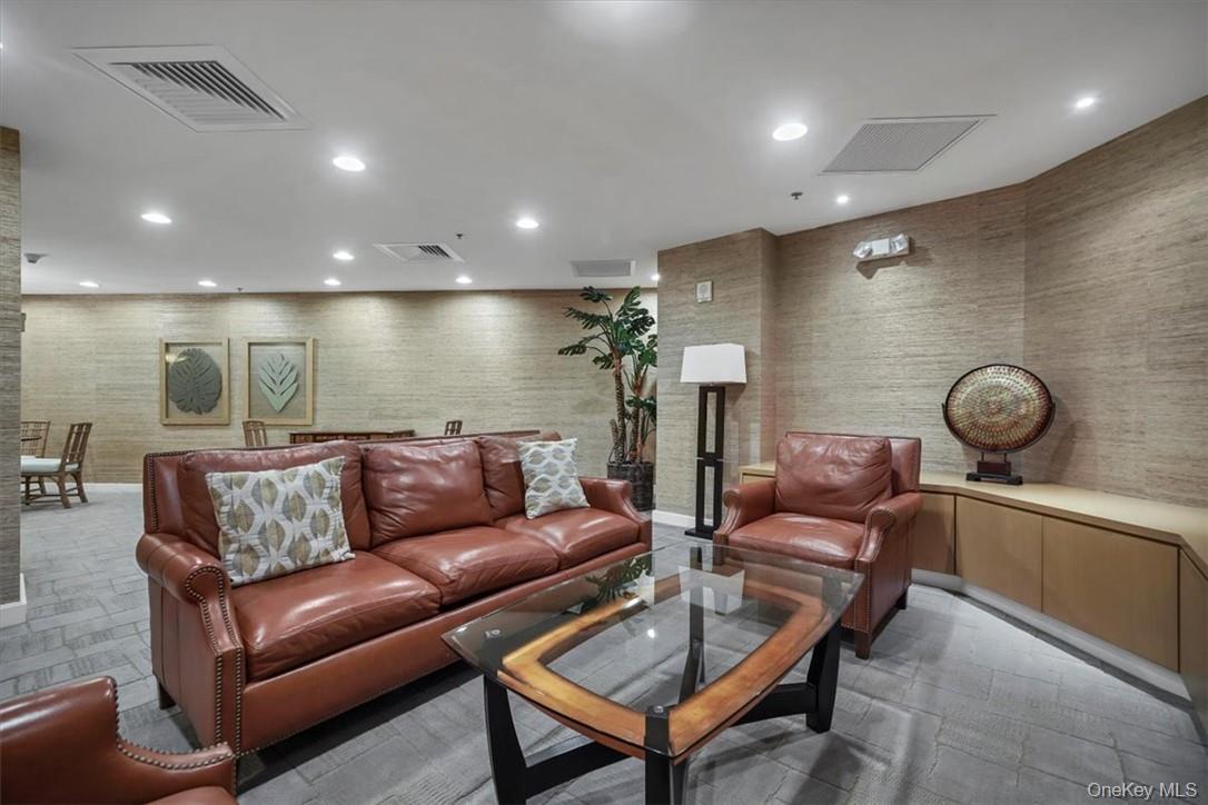 1 Renaissance Square, Unit 9D White Plains, NY 10601 - Photo 14 of 17 a living room with furniture