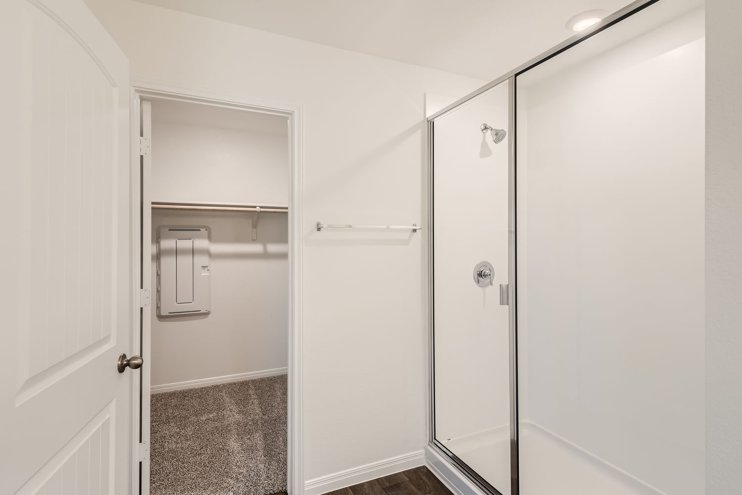 508 Gladiola Loop Kyle, TX 78640 - Photo 7 of 11 a bathroom with a glass shower door