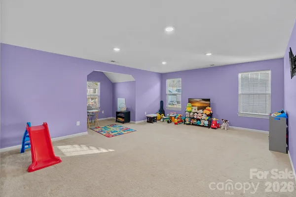 a bedroom with furniture and a bed