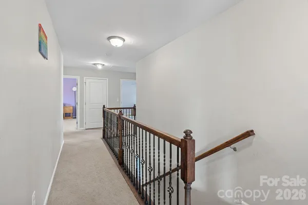 a view of a hallway with entryway