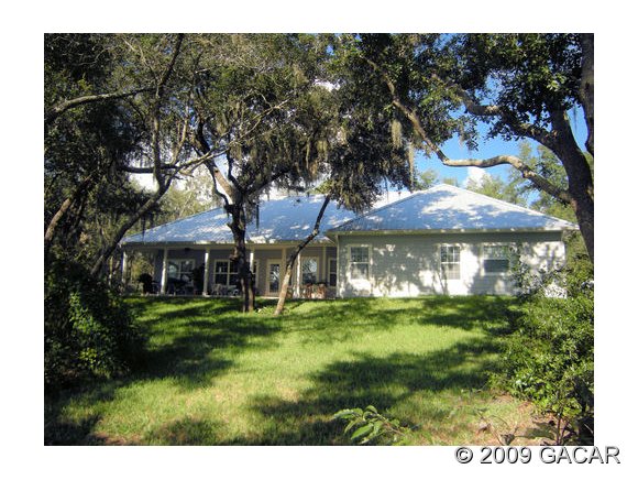 232 Huckleberry Road Hawthorne, FL 32640 - Photo 1 of 1 View of home from the lake