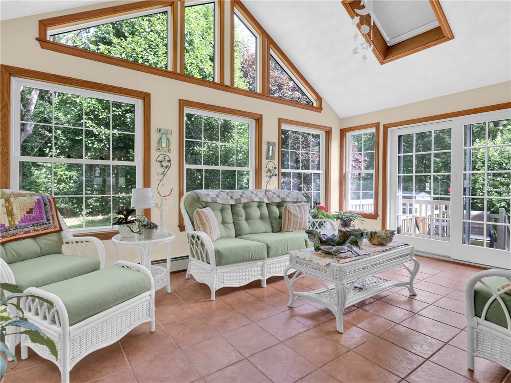 285 Joslin Road Burrillville, RI 02826 - Photo 14 of 41 Heated sunroom with vaulted ceilings