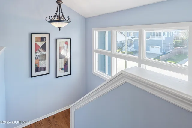 a view of empty room with windows