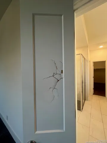 a bathroom with a bathtub and a sink