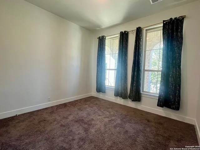 a view of small space with racks on the wall