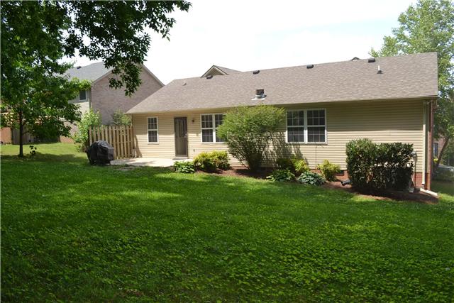 130 La View Road Hendersonville, TN 37075 - Photo 17 of 20 Pretty landscaping frames the back of the home & around the patio with privacy wall.