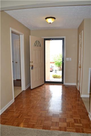 130 La View Road Hendersonville, TN 37075 - Photo 3 of 20 Entry Foyer with hardwood floor, coat closet, full view glass storm door, and front door with starburst glass insert.