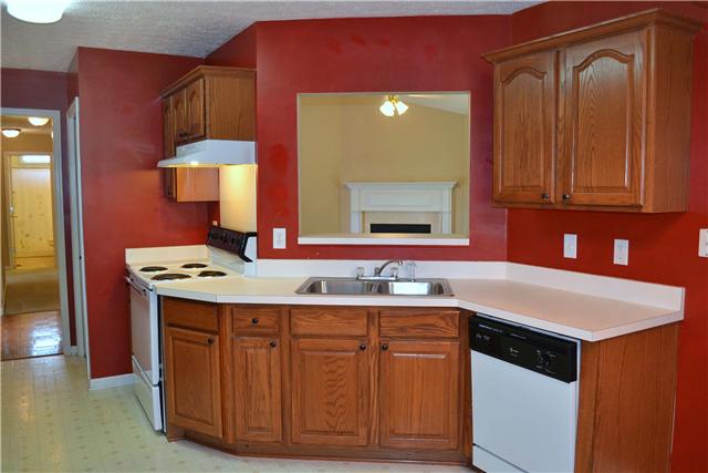 130 La View Road Hendersonville, TN 37075 - Photo 9 of 20 A convenient pass thru window to the Living Room not only opens the rooms up but also allows those in the Kitchen to enjoy the views of the backyard.