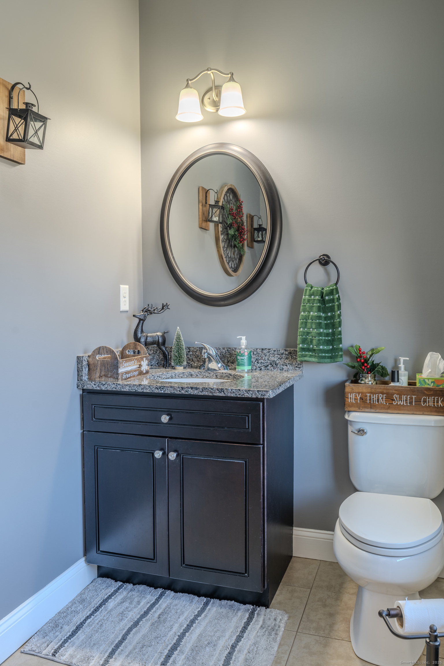 44 Trailside Crossing Middletown, CT 06457 - Photo 16 of 40 a bathroom with a toilet a sink and a mirror
