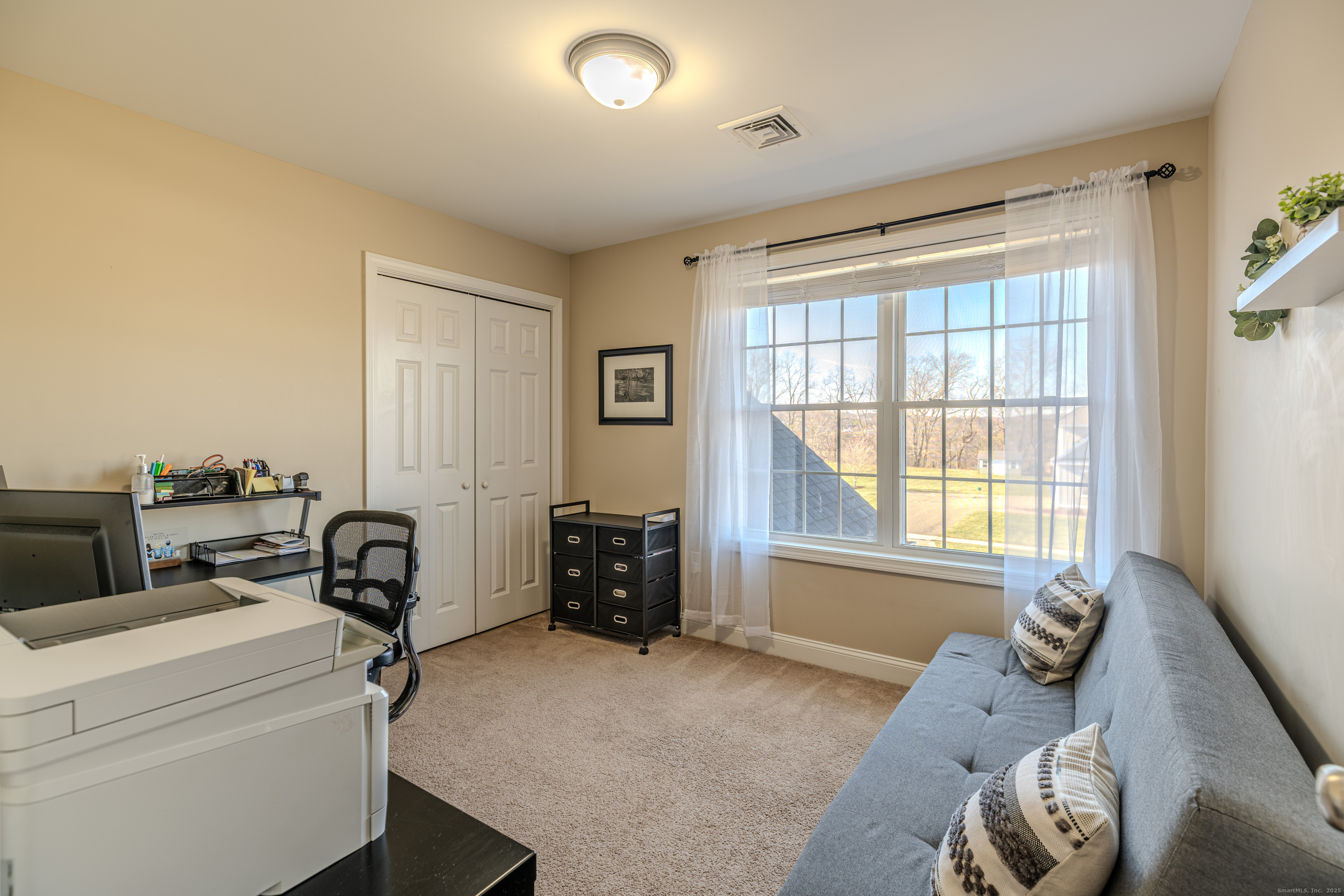 44 Trailside Crossing Middletown, CT 06457 - Photo 24 of 40 a bedroom with furniture and a window