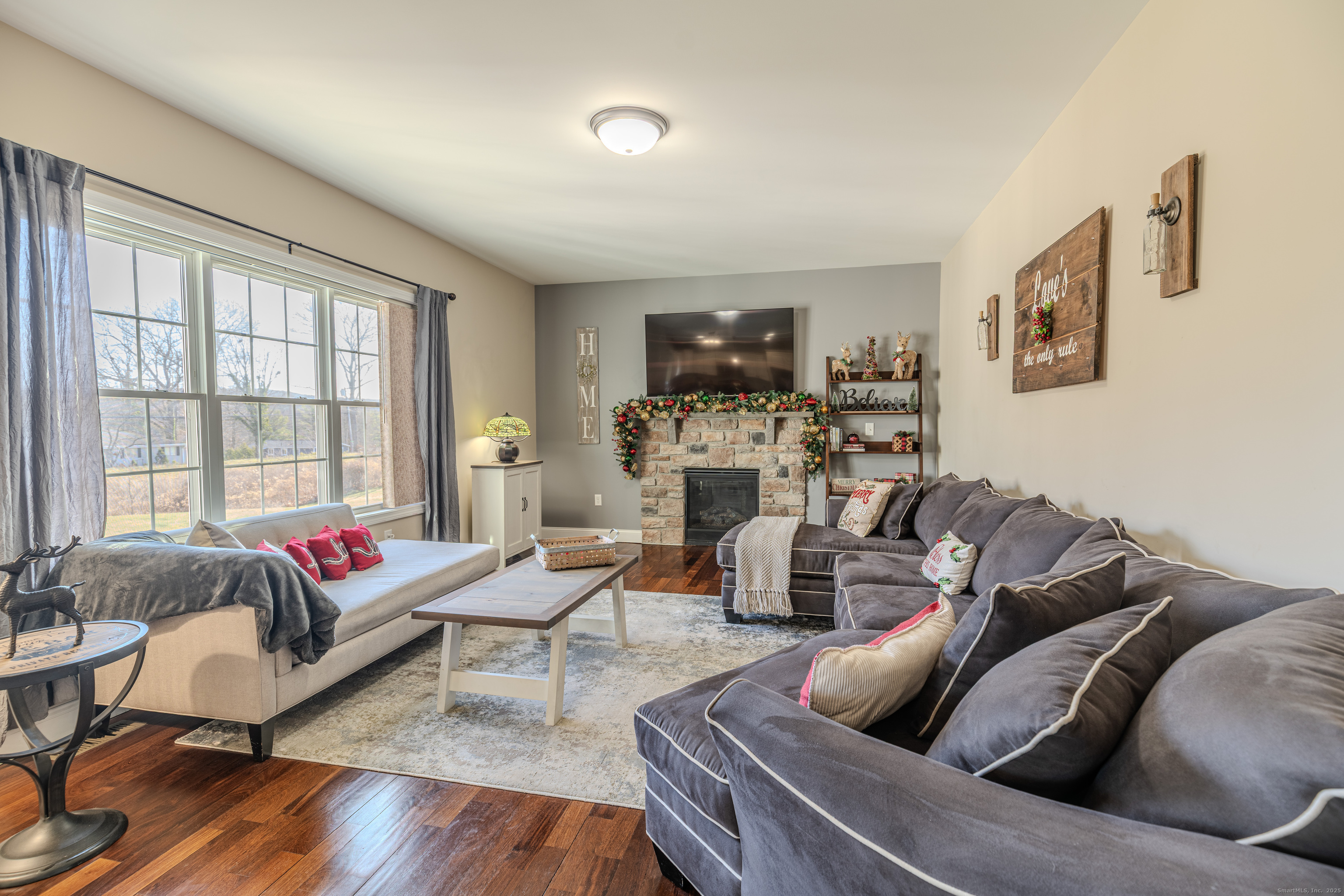 44 Trailside Crossing Middletown, CT 06457 - Photo 5 of 40 a living room with furniture and a flat screen tv