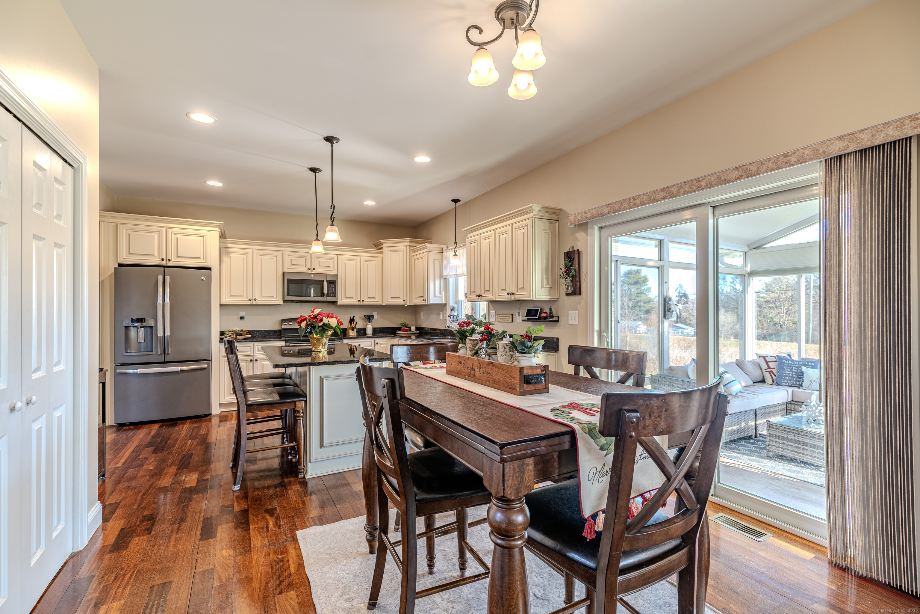 44 Trailside Crossing Middletown, CT 06457 - Photo 8 of 40 a view of a dining room with furniture window and wooden floor