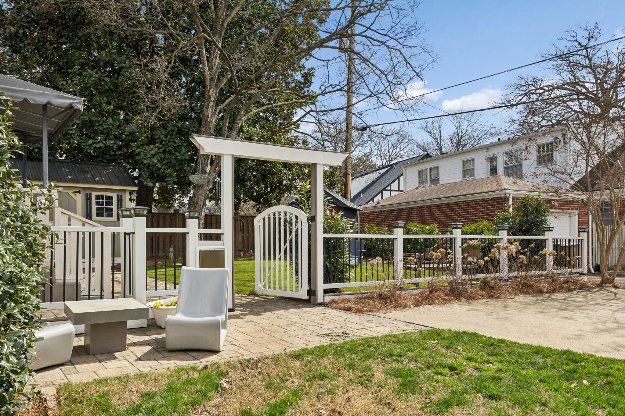 4029 Aberdeen Road Nashville, TN 37205 - Photo 34 of 51 a view of a chair and tables in the patio