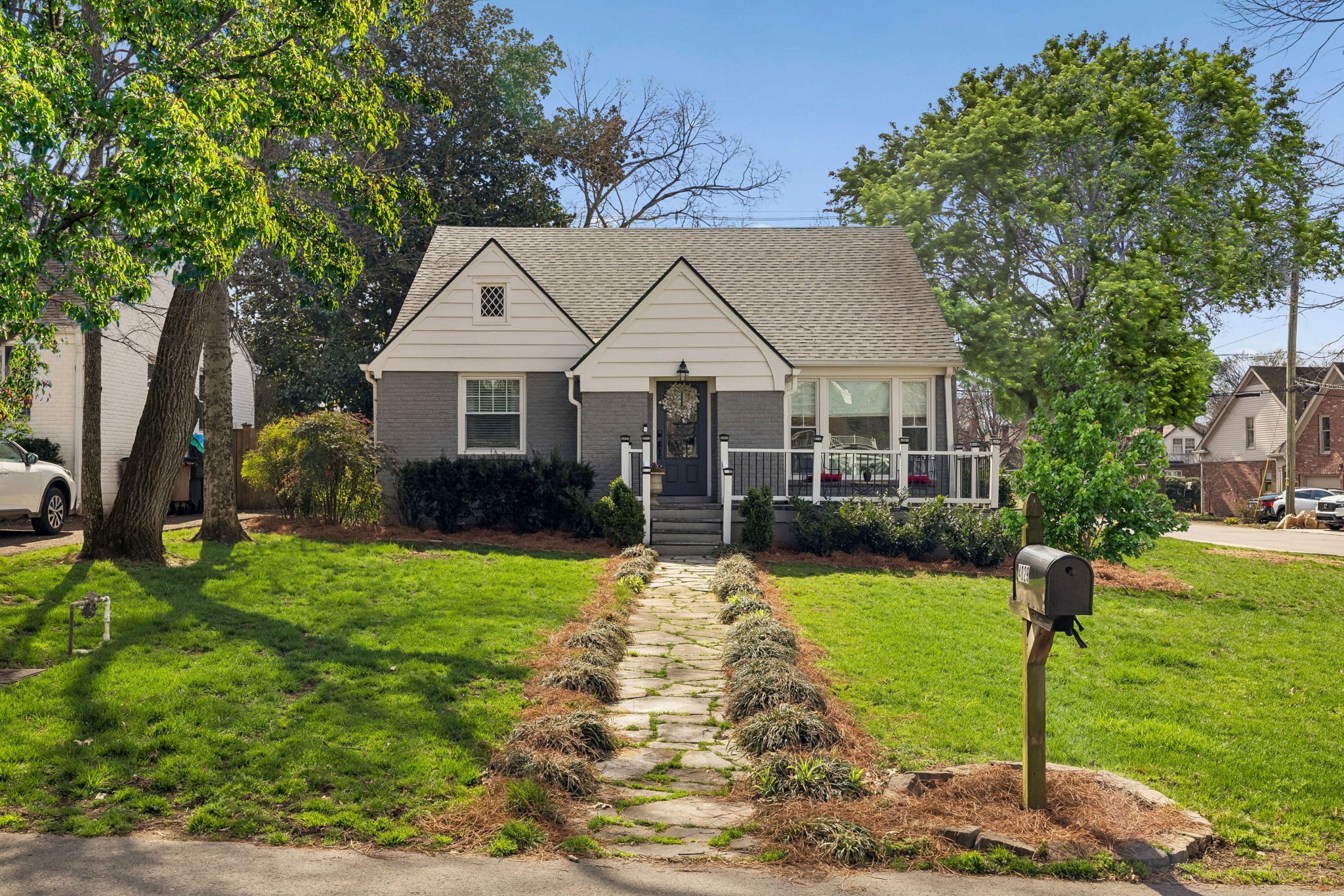 4029 Aberdeen Road Nashville, TN 37205 - Photo 4 of 51 a front view of a house with garden