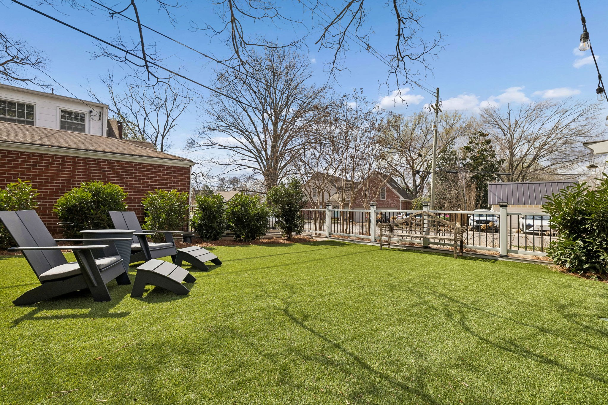 4029 Aberdeen Road Nashville, TN 37205 - Photo 41 of 51 a view of a bench in a backyard