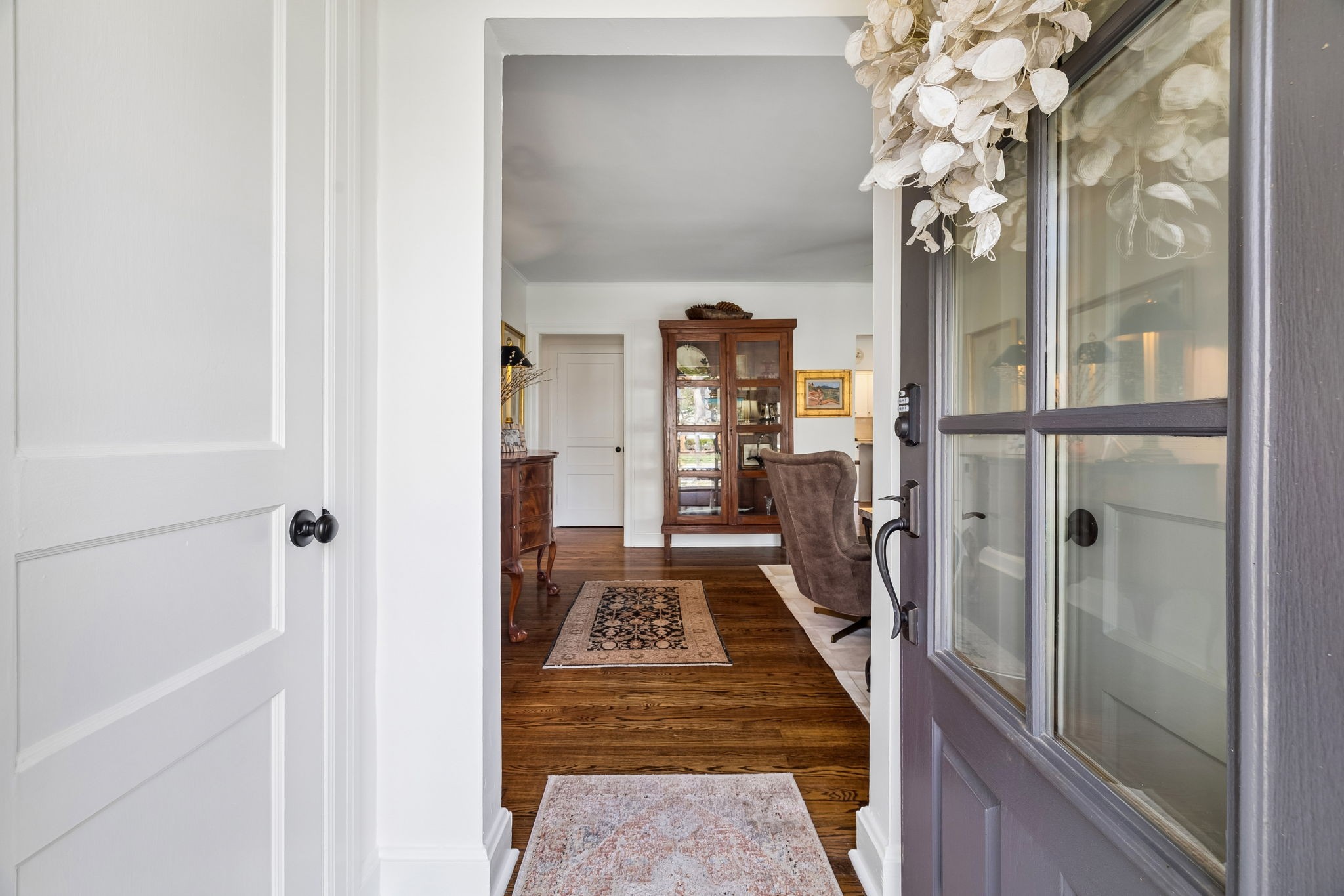 4029 Aberdeen Road Nashville, TN 37205 - Photo 6 of 51 a view of a hallway with wooden floor and staircase
