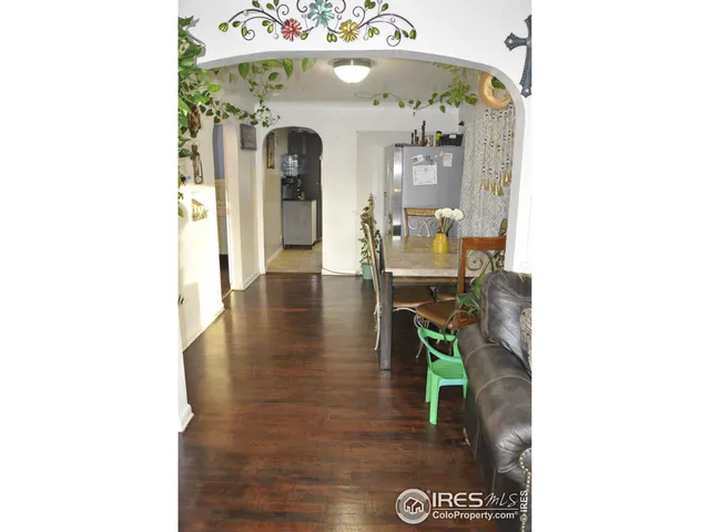 a view of a living room with a hallway