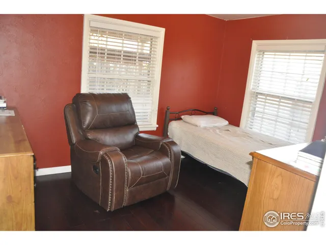 a view of livingroom with furniture and a window