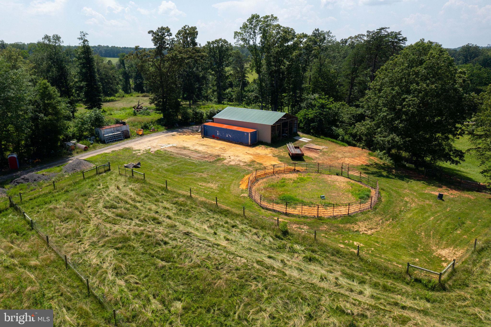 11997 Bristersburg Road Midland, VA 22728 - Photo 11 of 38 an outdoor space with swimming pool and trees