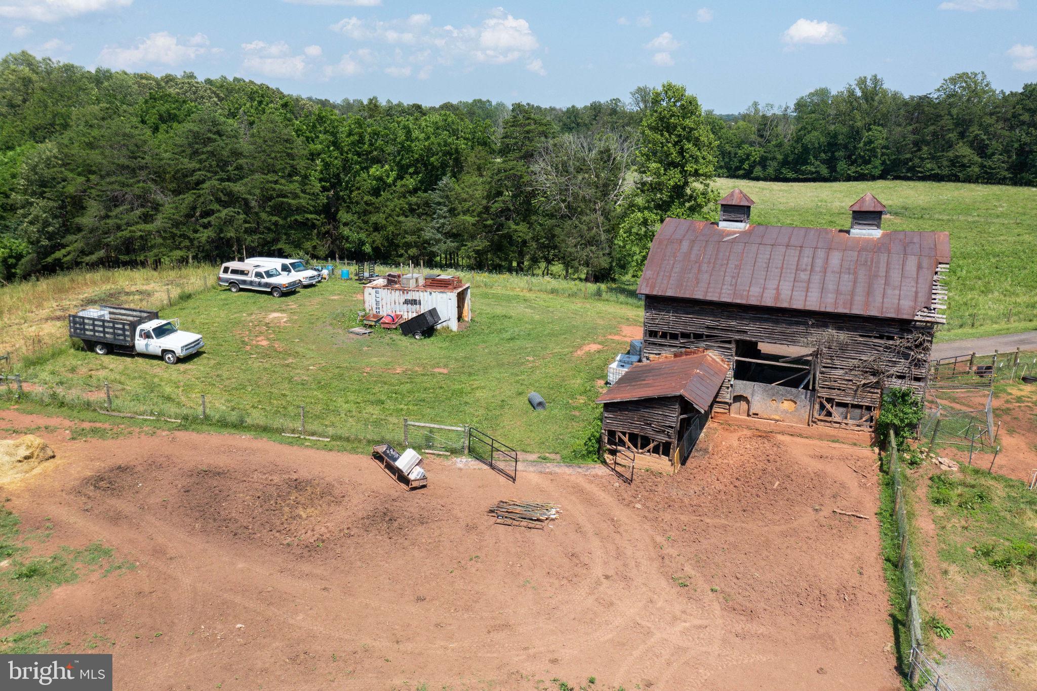 11997 Bristersburg Road Midland, VA 22728 - Photo 14 of 38 a backyard of a house with seating space
