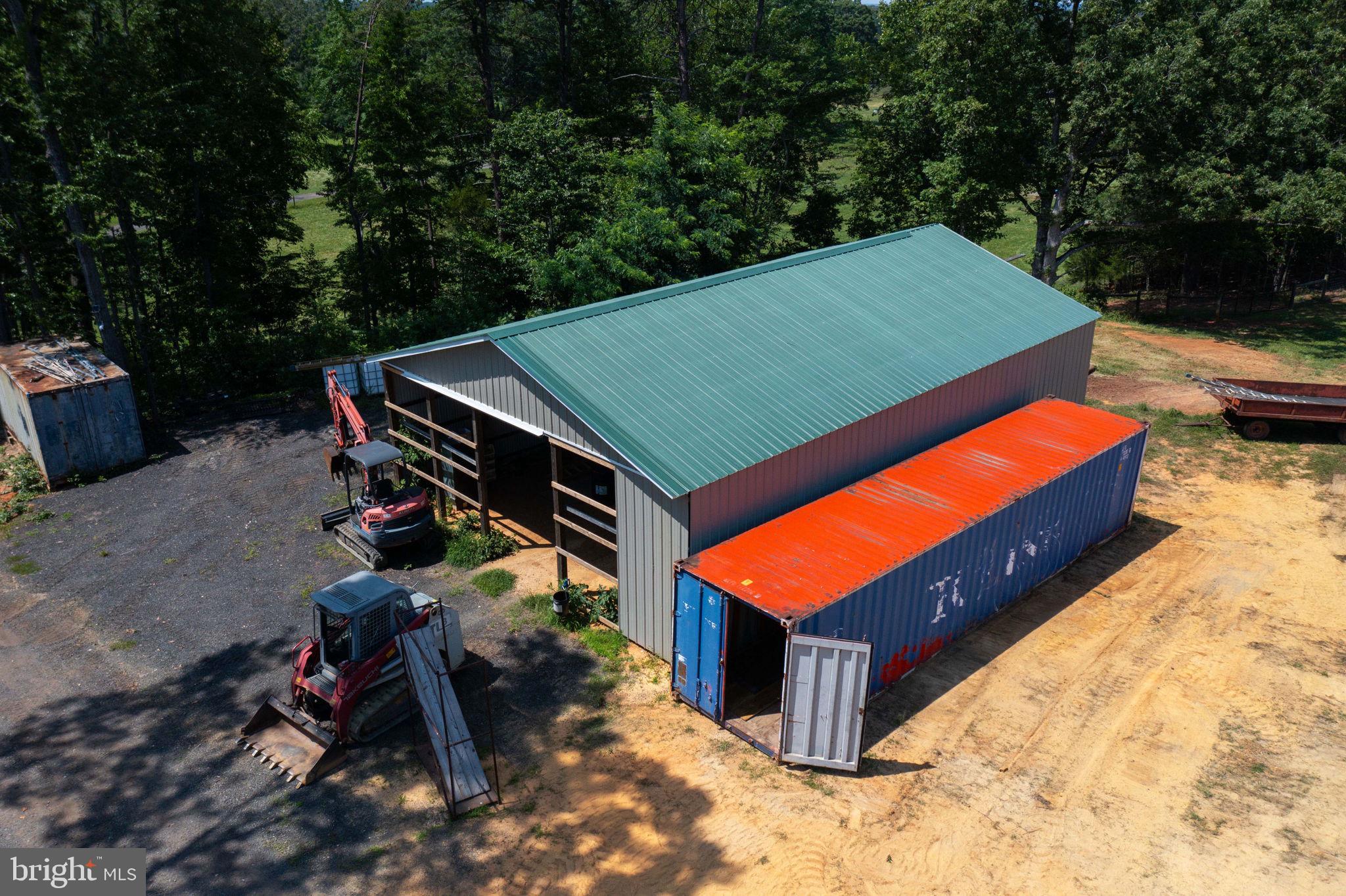 11997 Bristersburg Road Midland, VA 22728 - Photo 16 of 38 a view of a backyard with chairs and a grill