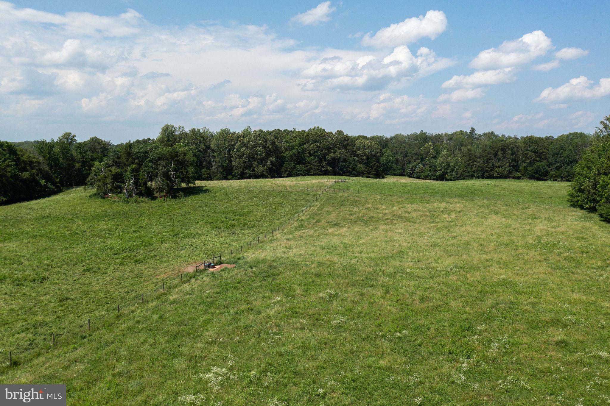 11997 Bristersburg Road Midland, VA 22728 - Photo 18 of 38 a view of a big yard with lots of green space