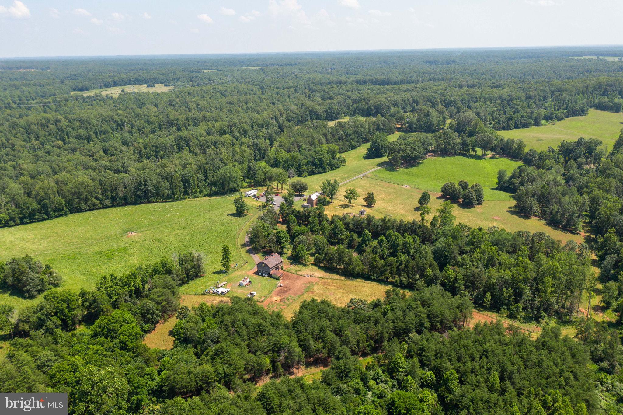 11997 Bristersburg Road Midland, VA 22728 - Photo 21 of 38 an aerial view of residential house with outdoor space and trees all around
