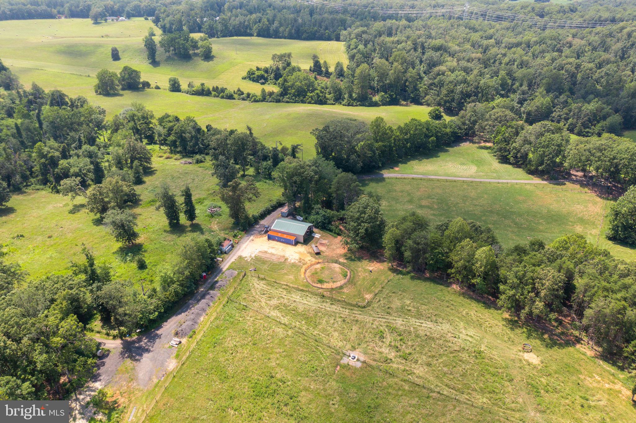 11997 Bristersburg Road Midland, VA 22728 - Photo 29 of 38 a view of a swimming pool with a yard