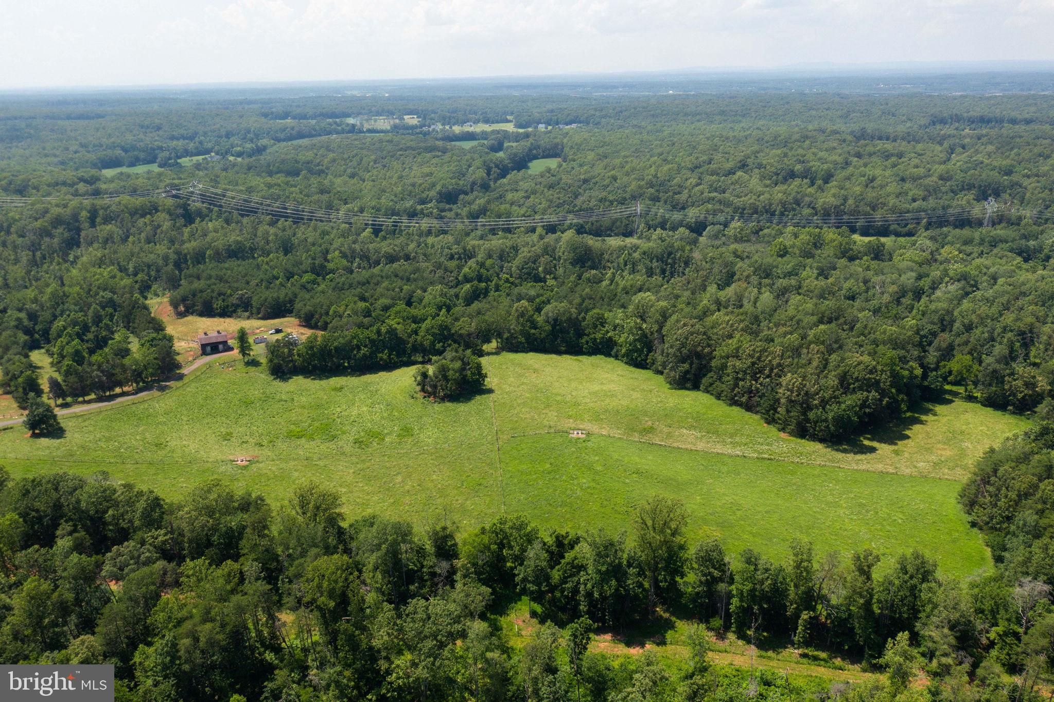 11997 Bristersburg Road Midland, VA 22728 - Photo 34 of 38 a view of a lake with a yard