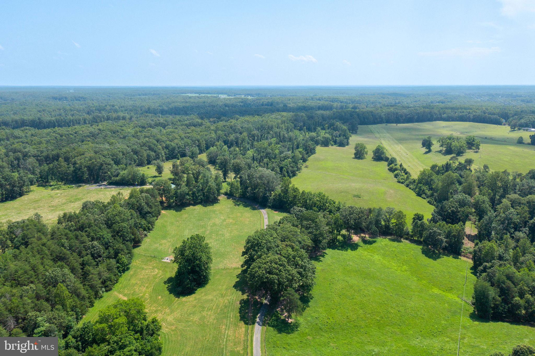 11997 Bristersburg Road Midland, VA 22728 - Photo 35 of 38 a view of a lake with a yard