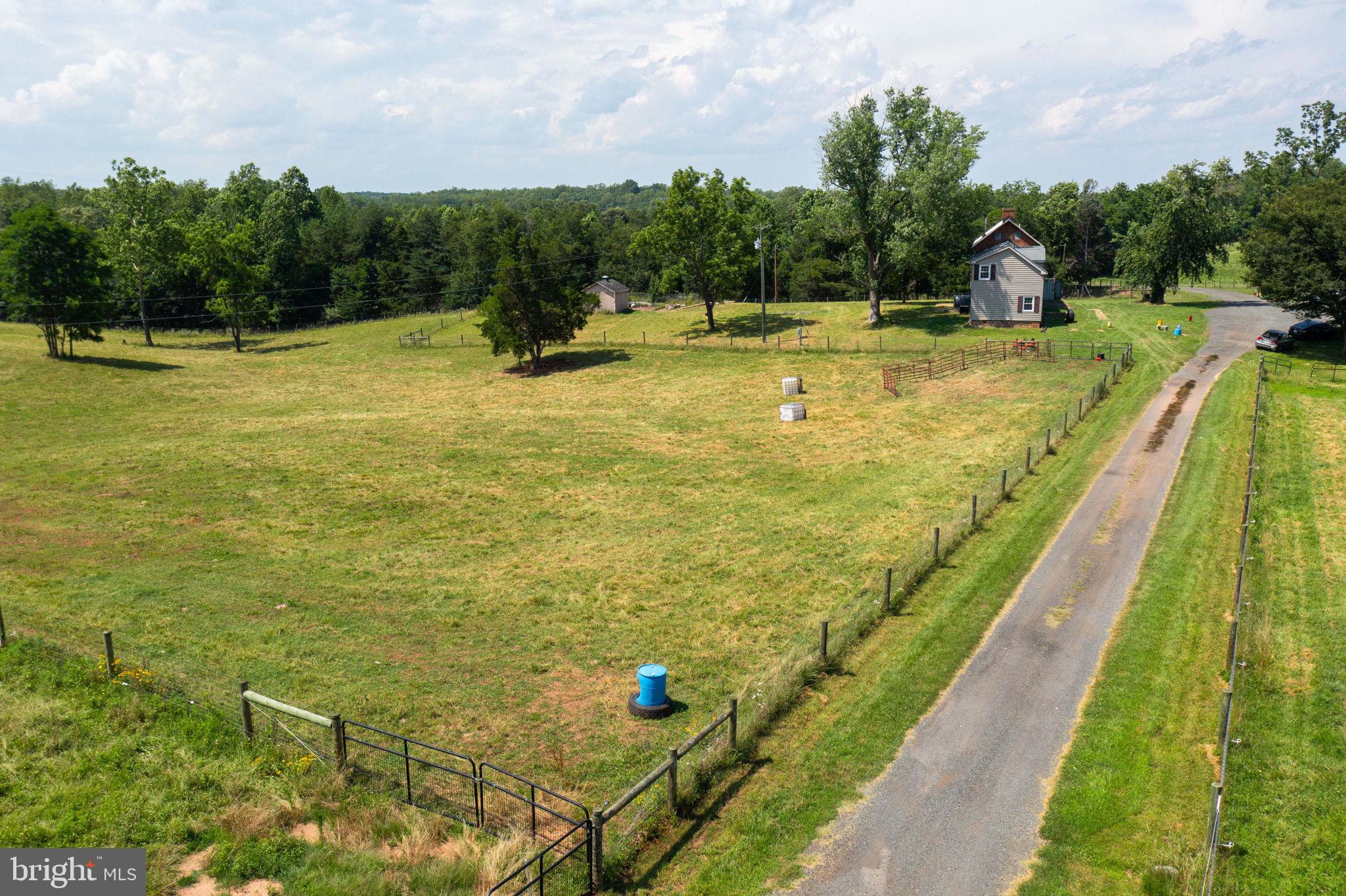 11997 Bristersburg Road Midland, VA 22728 - Photo 36 of 38 a view of a swimming pool with a yard