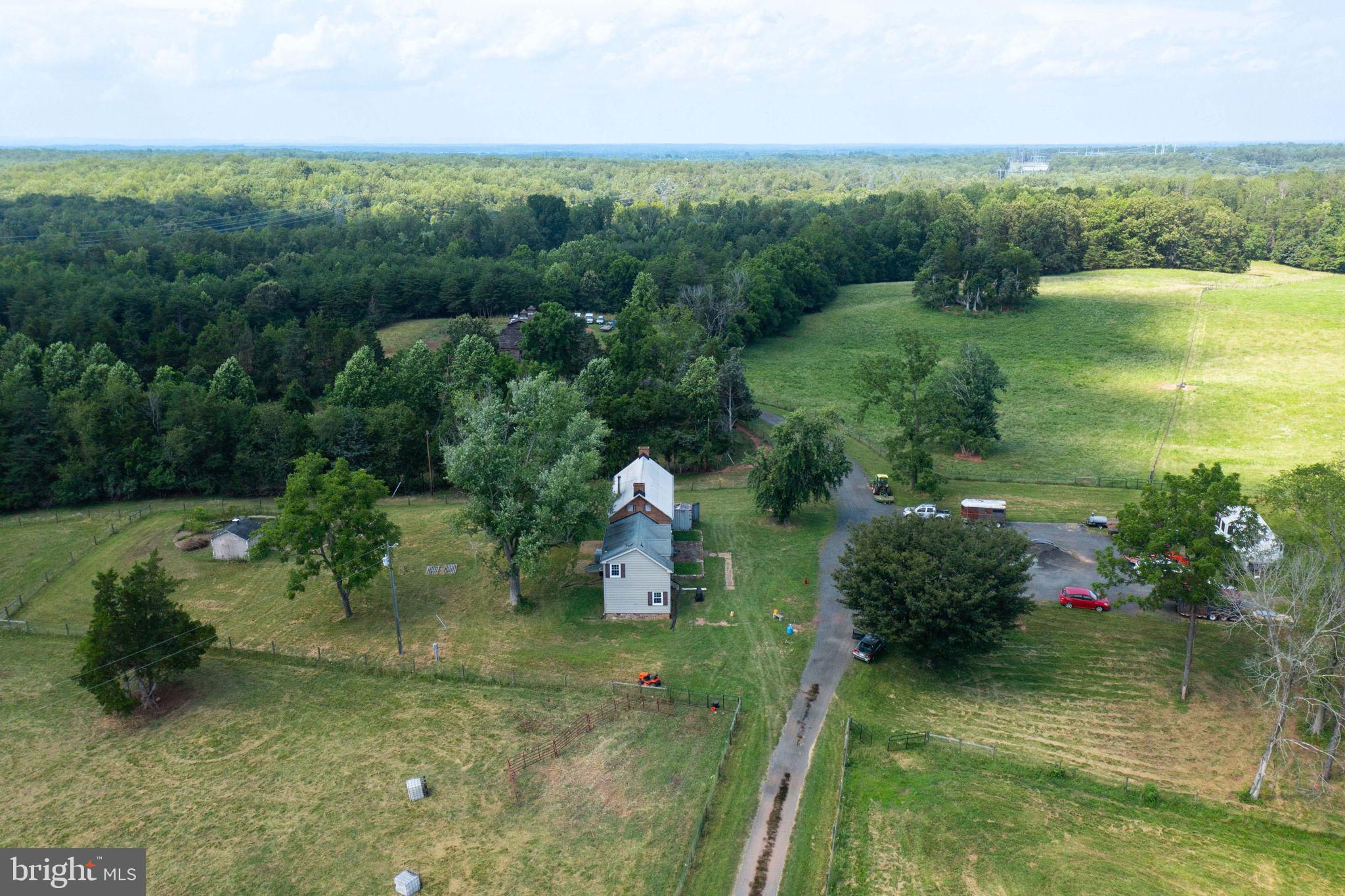 11997 Bristersburg Road Midland, VA 22728 - Photo 6 of 38 a backyard of a house with a yard and lake view