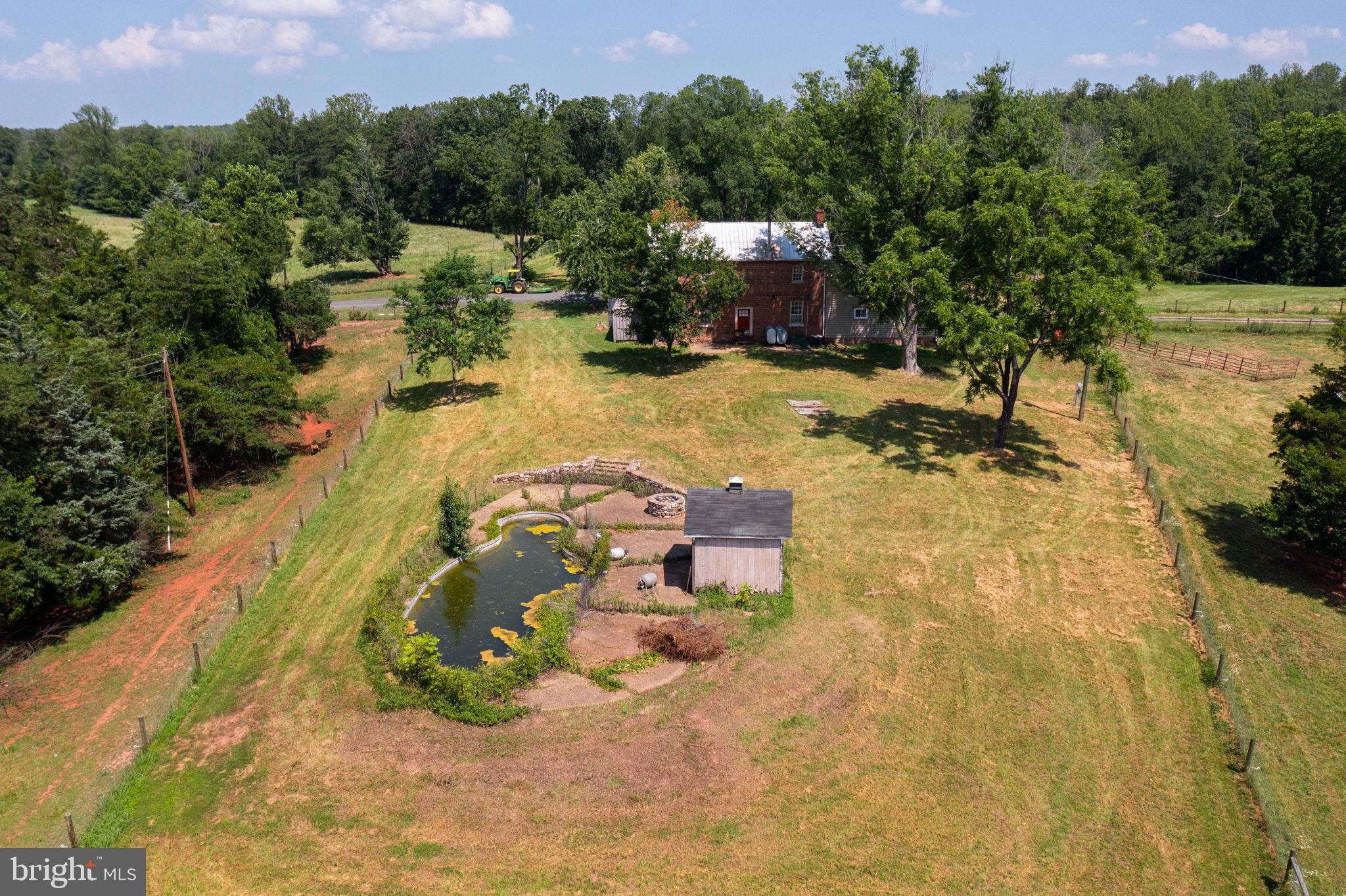 11997 Bristersburg Road Midland, VA 22728 - Photo 7 of 38 a view of a swimming pool with a patio