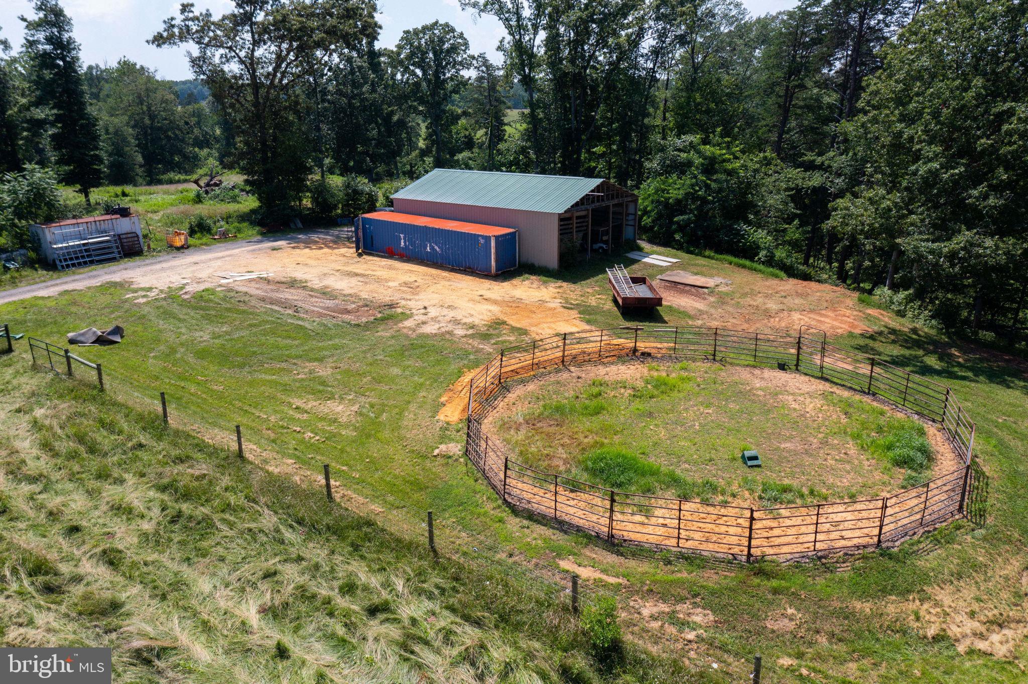 11997 Bristersburg Road Midland, VA 22728 - Photo 10 of 38 a view of swimming pool with a garden and trees