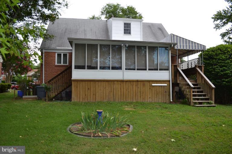 12702 Feldon Street Silver Spring, MD 20906 - Photo 2 of 11 a view of a house with a yard