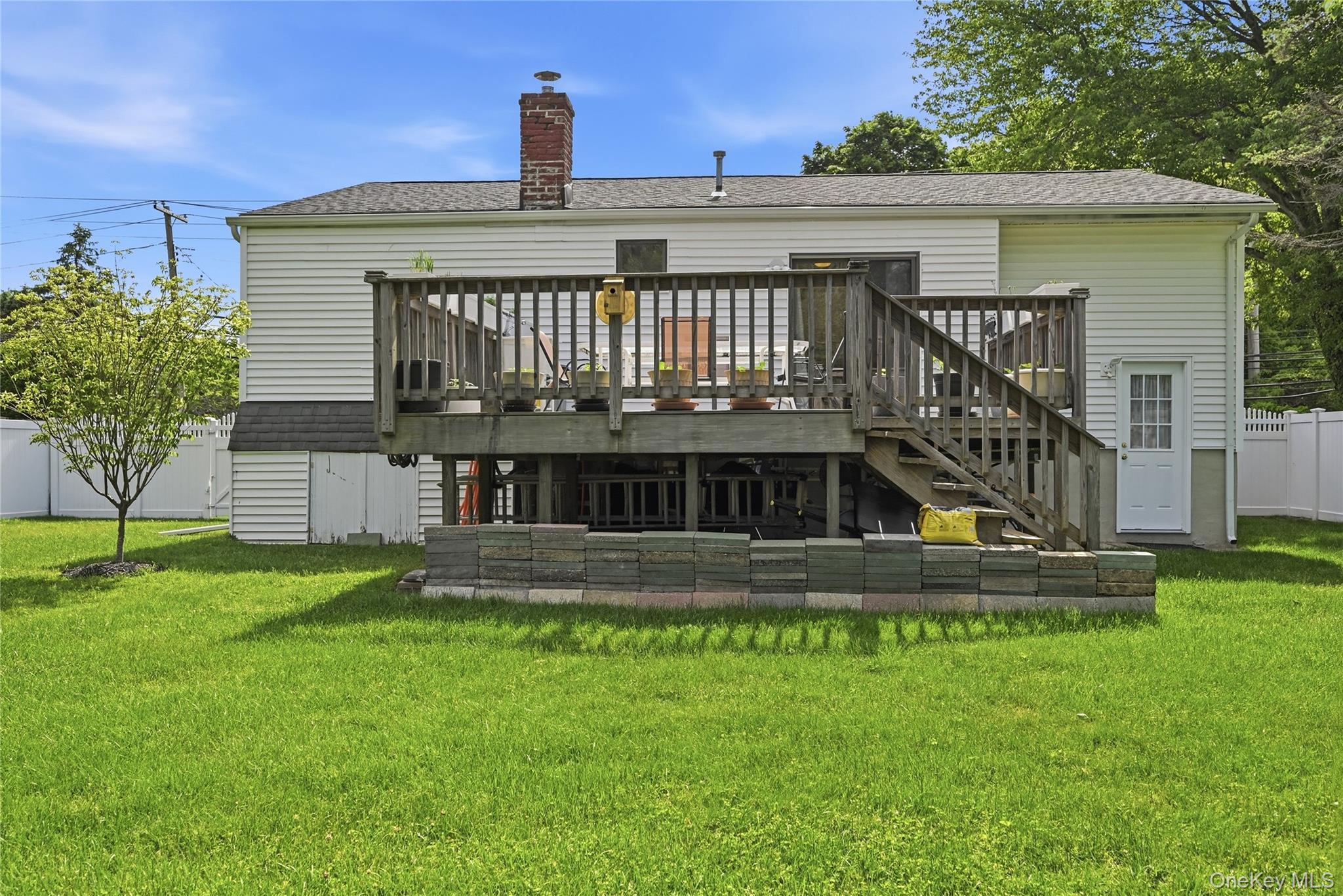 35 Randall Road Shoreham, NY 11786 - Photo 27 of 32 a view of a house with a yard