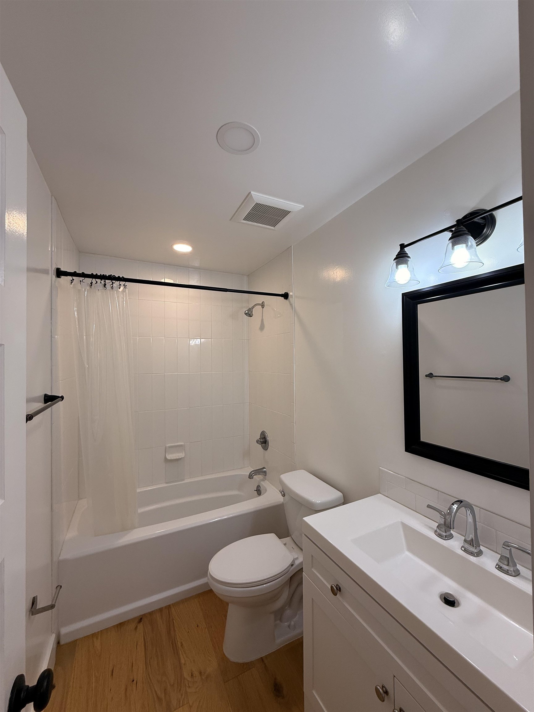 521 Christopher Street St. Augustine, FL 32084 - Photo 11 of 17 a bathroom with a sink a toilet and shower