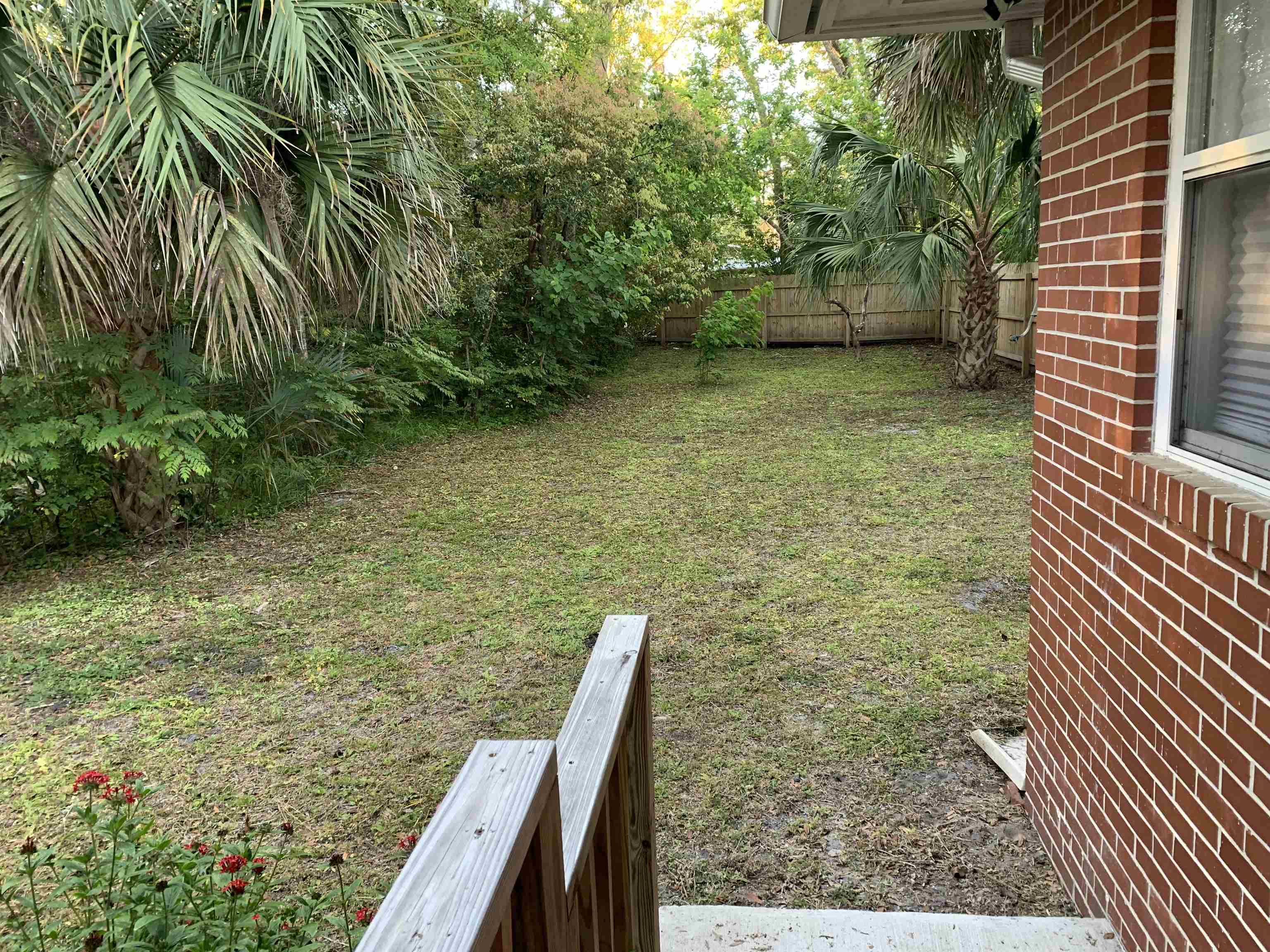 521 Christopher Street St. Augustine, FL 32084 - Photo 16 of 17 a view of a garden from a balcony