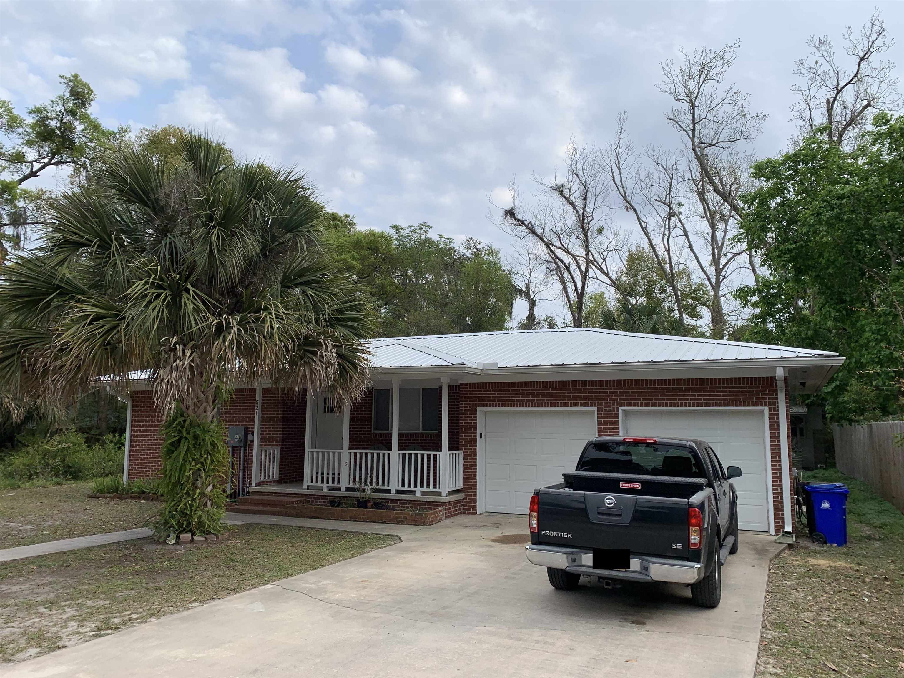521 Christopher Street St. Augustine, FL 32084 - Photo 17 of 17 a car parked in front of house