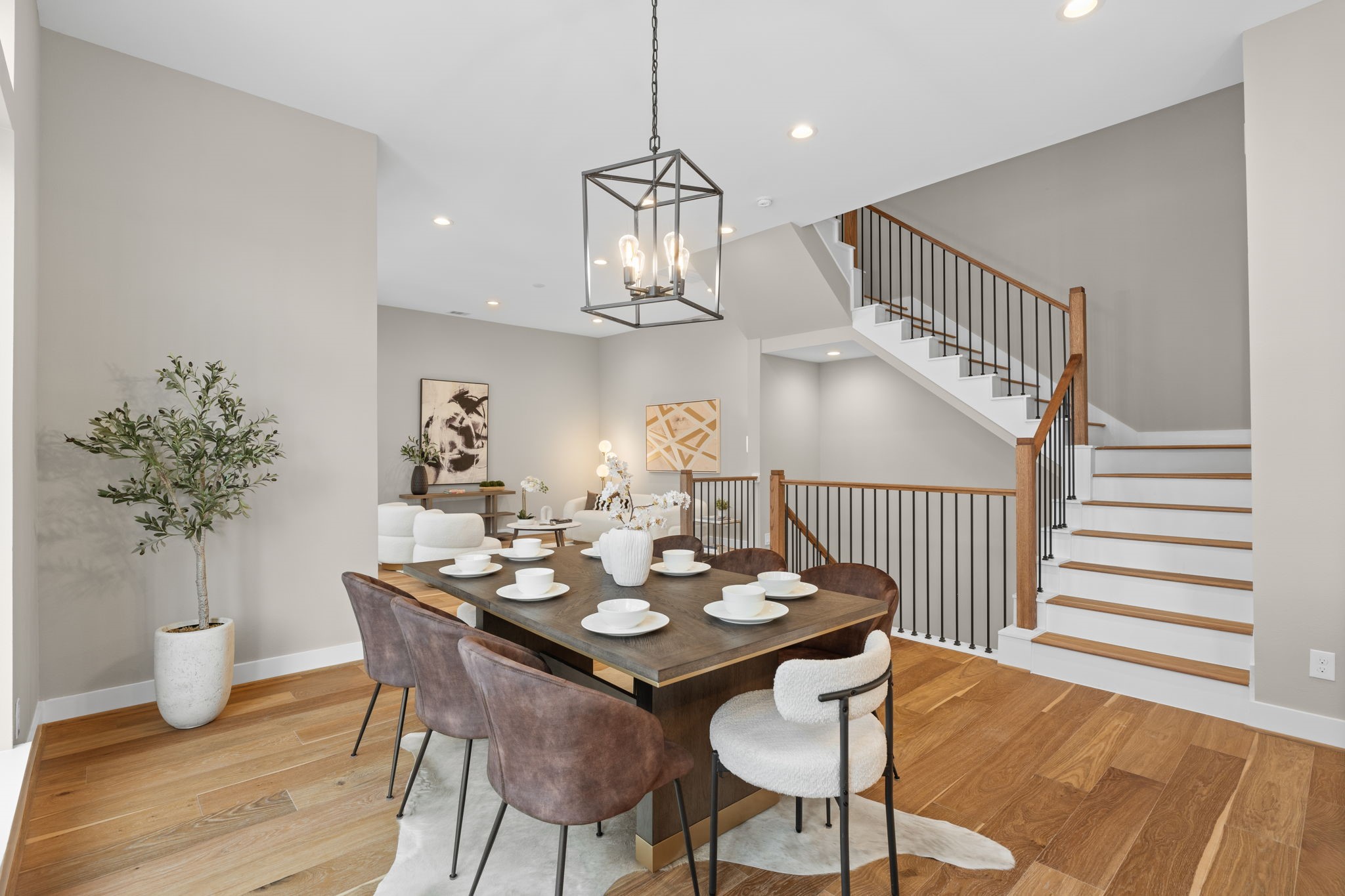 1177 West 19th Street Houston, TX 77008 - Photo 20 of 40 a view of a dining room with furniture wooden floor and chandelier