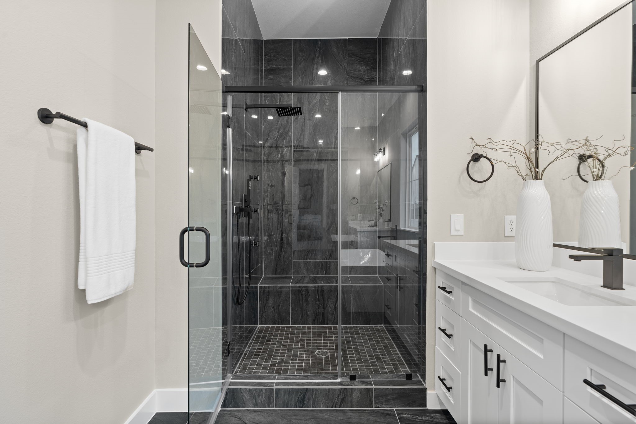 1177 West 19th Street Houston, TX 77008 - Photo 34 of 40 a bathroom with a shower sink and mirror