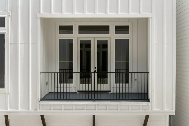 a bedroom with furniture and window