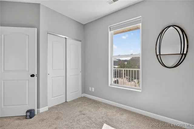 $409,000 | 186 Sunset Palms Drive, Unit 4C, Camdenton, MO 65020